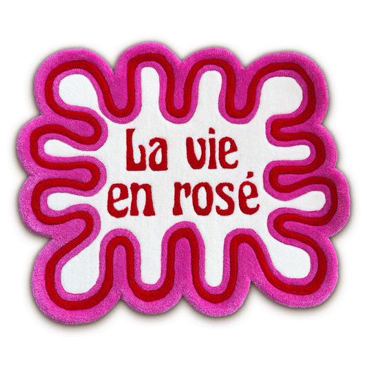 La Vie en Rosé hand-tufted art rug — wavy pink and crimson, 68x85 cm, limited edition